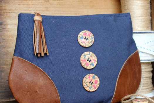 Use leather scraps to add corners to a basic zipper pouch